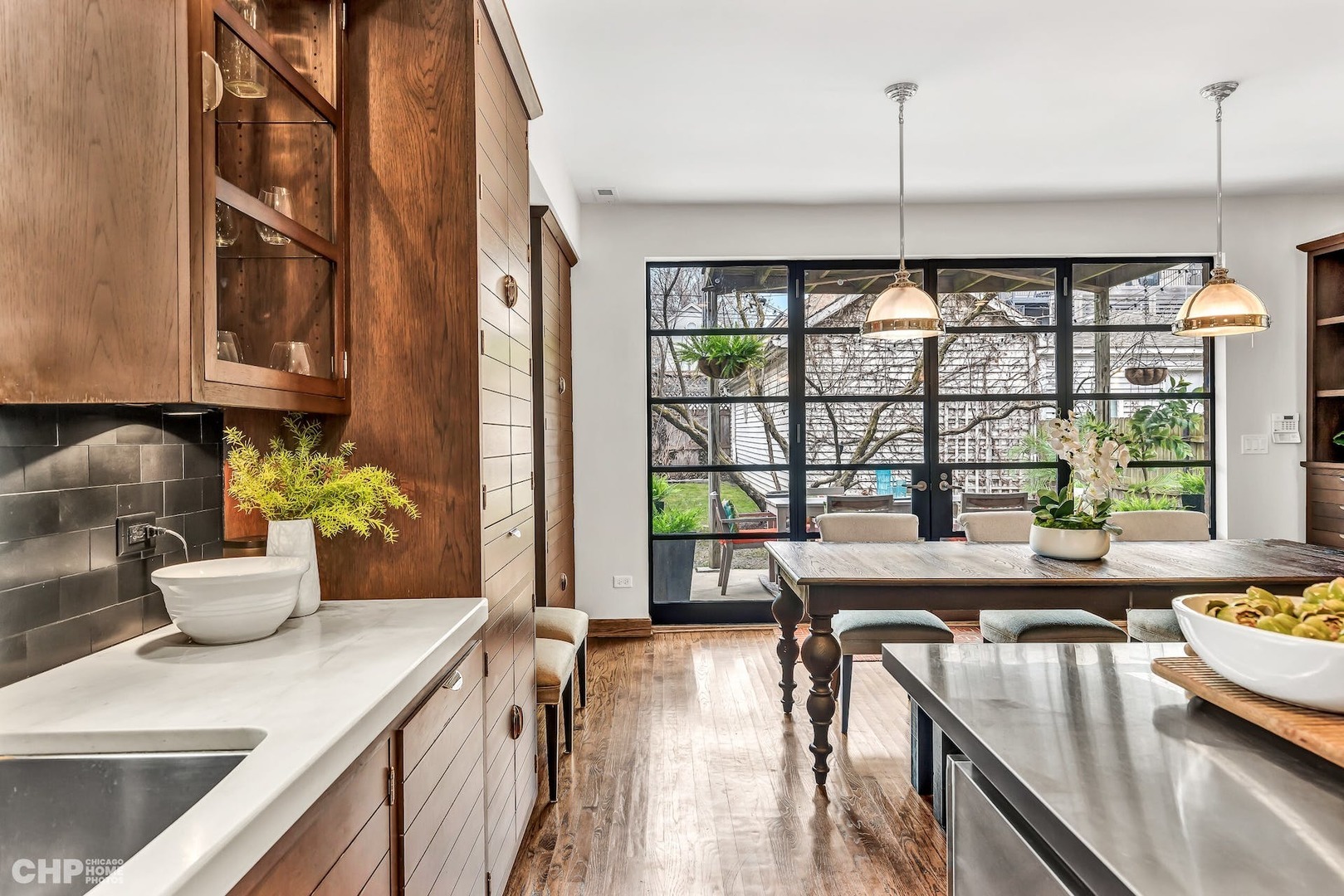 1844 West Rice Street Chicago, IL 60622 - Photo 15 of 28 a kitchen with a table and chairs
