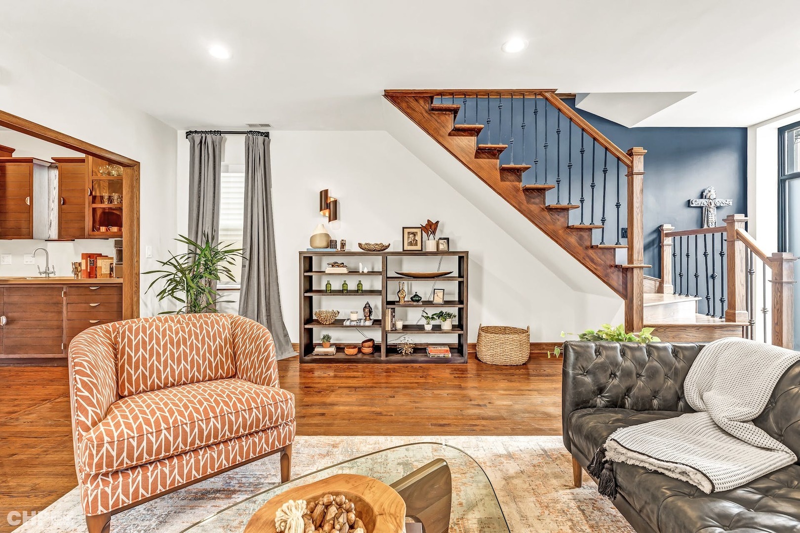 1844 West Rice Street Chicago, IL 60622 - Photo 7 of 28 a living room with furniture or stairs and a wooden floor