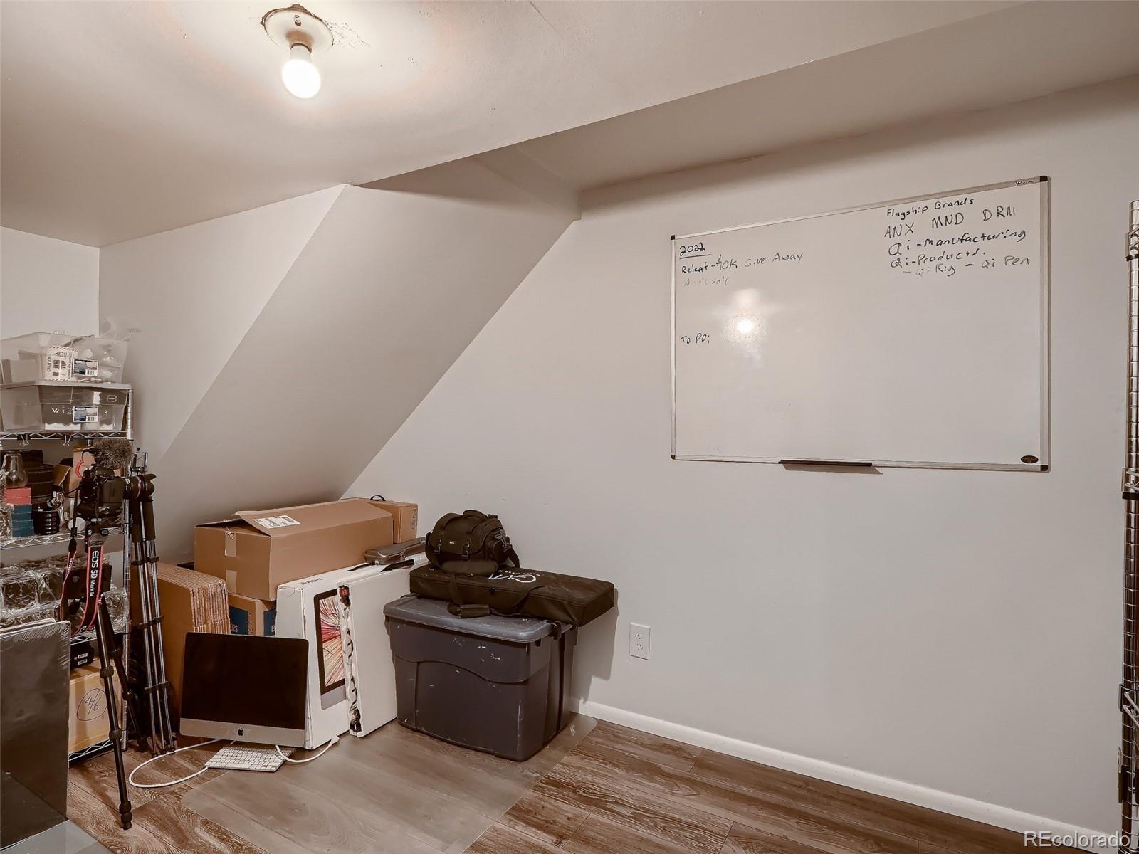 1230 South Reed Street, Unit 4 Lakewood, CO 80232 - Photo 19 of 28 a room with storage and utility