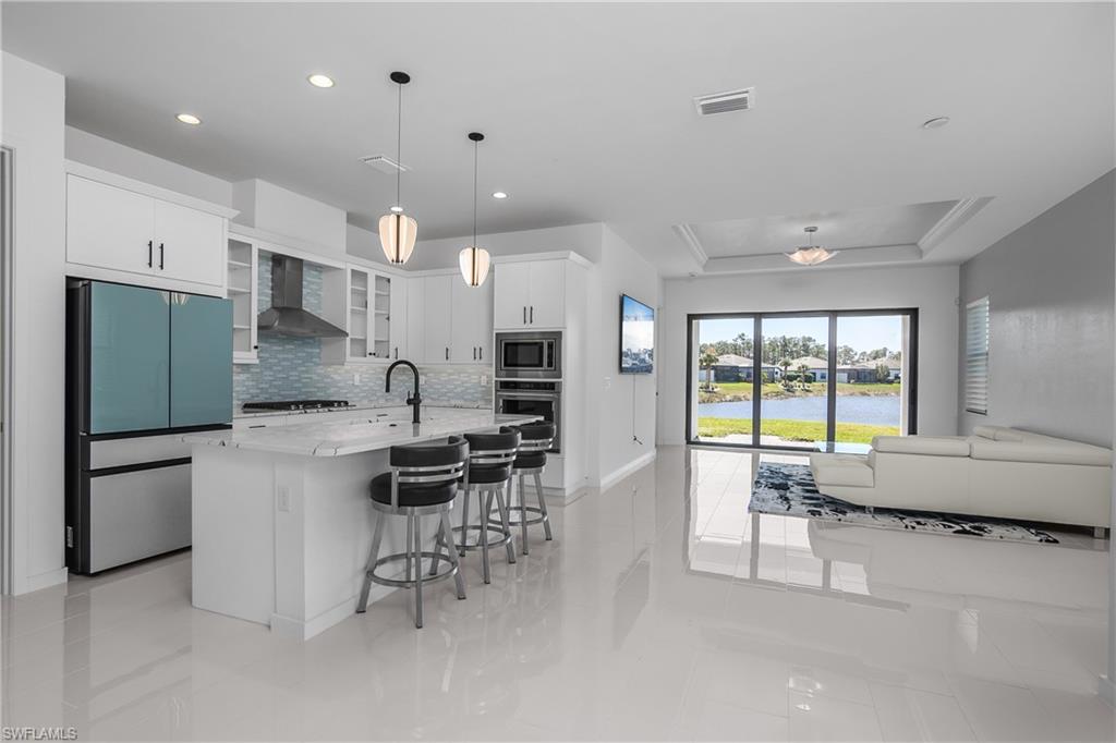 14854 Loggerhead Drive Naples, FL 34120 - Photo 11 of 36