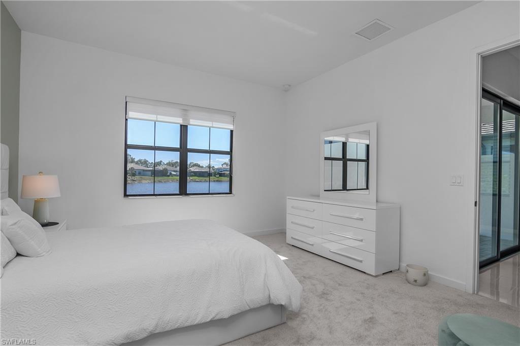 14854 Loggerhead Drive Naples, FL 34120 - Photo 17 of 36 Master Bedroom with water view