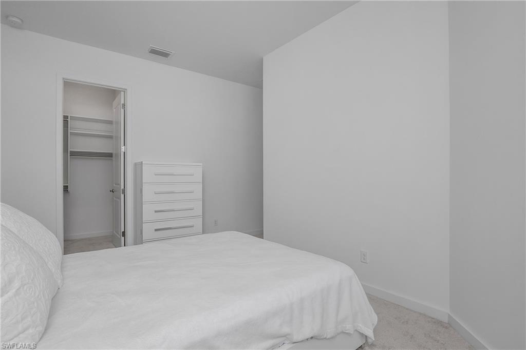 14854 Loggerhead Drive Naples, FL 34120 - Photo 23 of 36 Second bedroom with a spacious closet