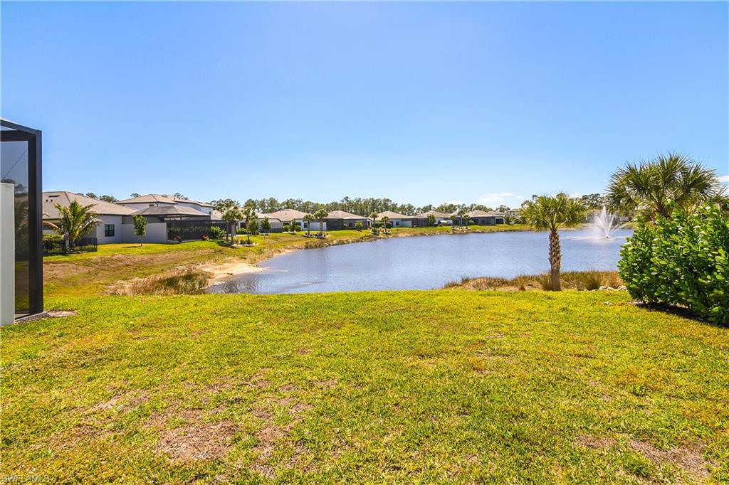 14854 Loggerhead Drive Naples, FL 34120 - Photo 29 of 36 Lanai with water view