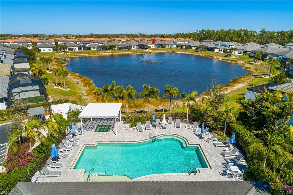 14854 Loggerhead Drive Naples, FL 34120 - Photo 32 of 36 Ariel view of community pool and lake