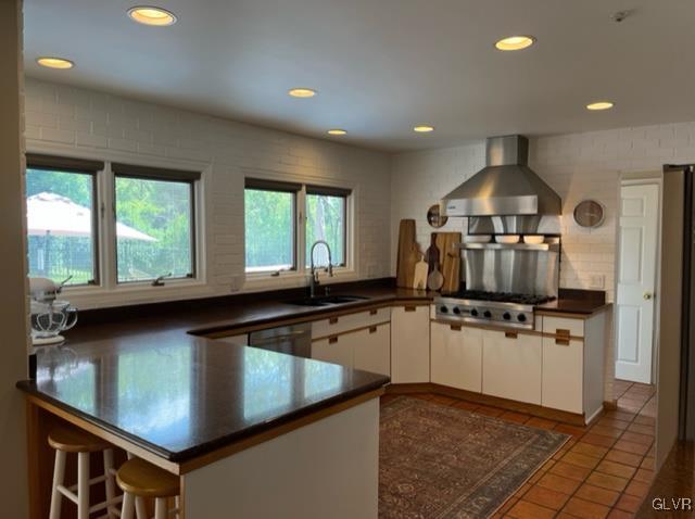 19 Bridle Path Road Bethlehem, PA 18017 - Photo 12 of 34 a kitchen with stainless steel appliances granite countertop a stove a sink and a microwave