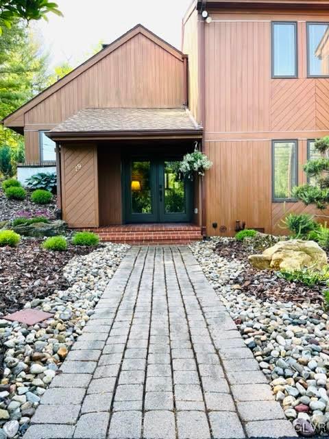 19 Bridle Path Road Bethlehem, PA 18017 - Photo 3 of 34 a front view of a house with garden