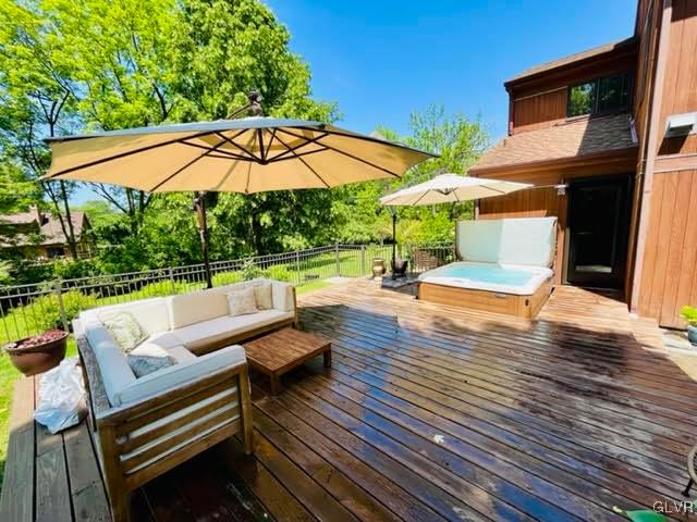 19 Bridle Path Road Bethlehem, PA 18017 - Photo 31 of 34 a view of a patio with a table and chairs under an umbrella