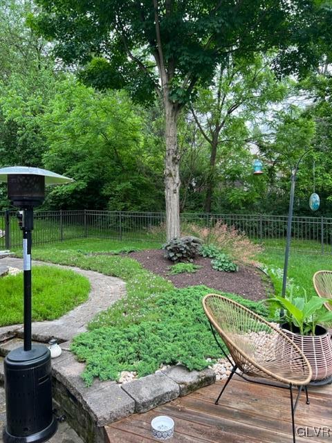 19 Bridle Path Road Bethlehem, PA 18017 - Photo 33 of 34 a view of a chair and table in backyard with plants and lake view