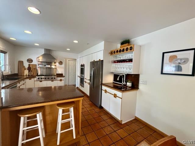 19 Bridle Path Road Bethlehem, PA 18017 - Photo 8 of 34 a kitchen with stainless steel appliances granite countertop a stove a sink and a refrigerator