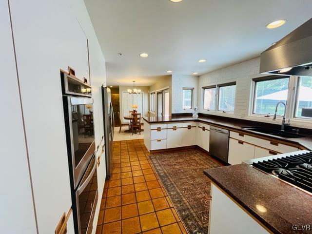 19 Bridle Path Road Bethlehem, PA 18017 - Photo 9 of 34 a large kitchen with stainless steel appliances granite countertop a sink and a stove