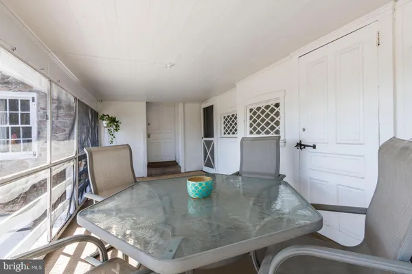 a view of a living room and dining room