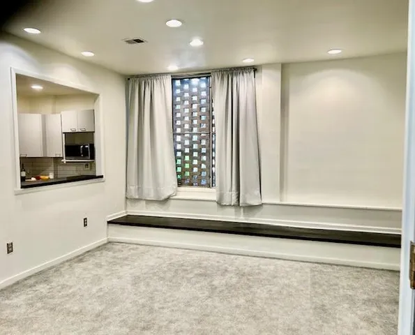a bathroom with a sink a vanity and a mirror
