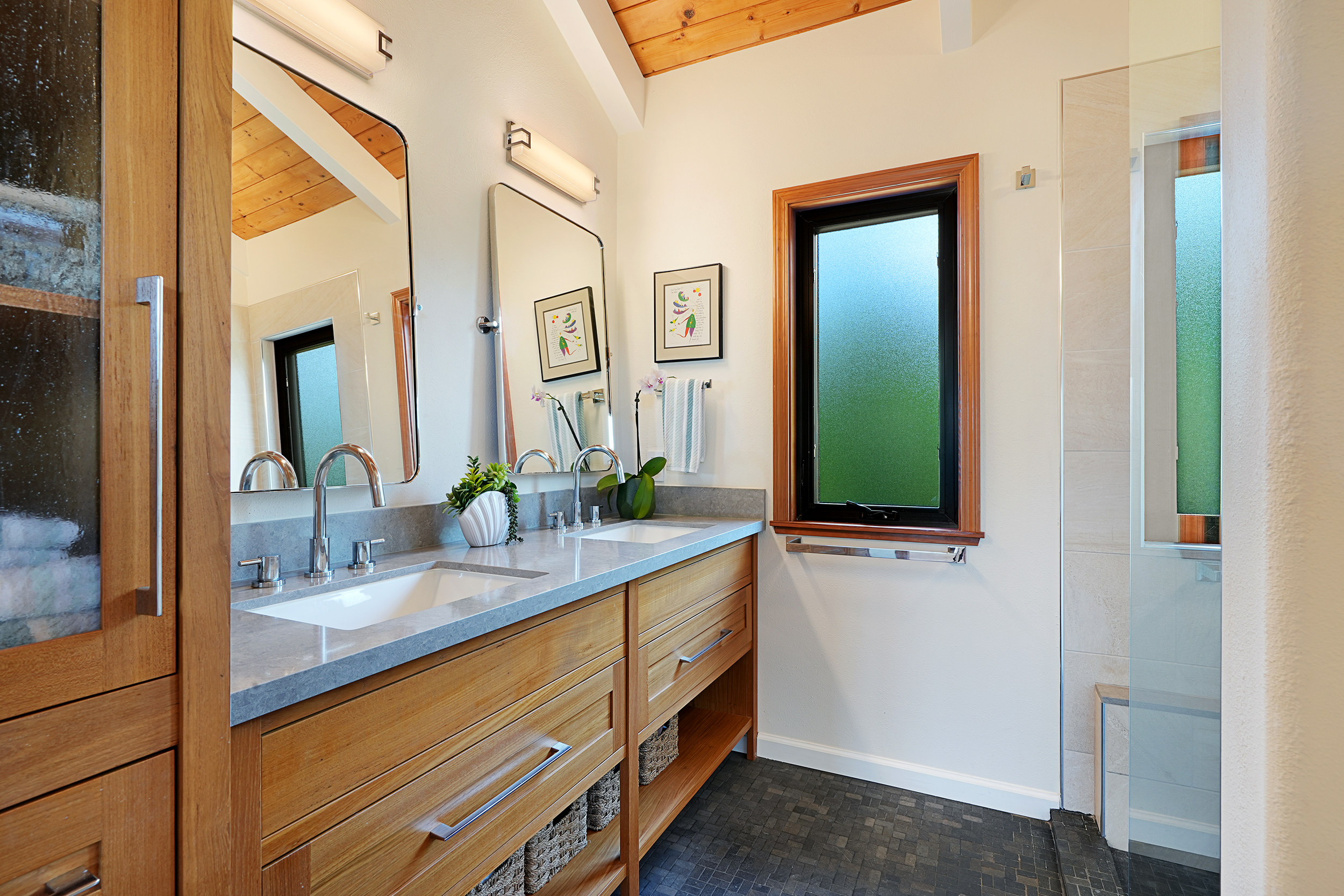 3667 Albert Road Princeville, HI 96722 - Photo 15 of 25 a bathroom with a double vanity sink and a mirror