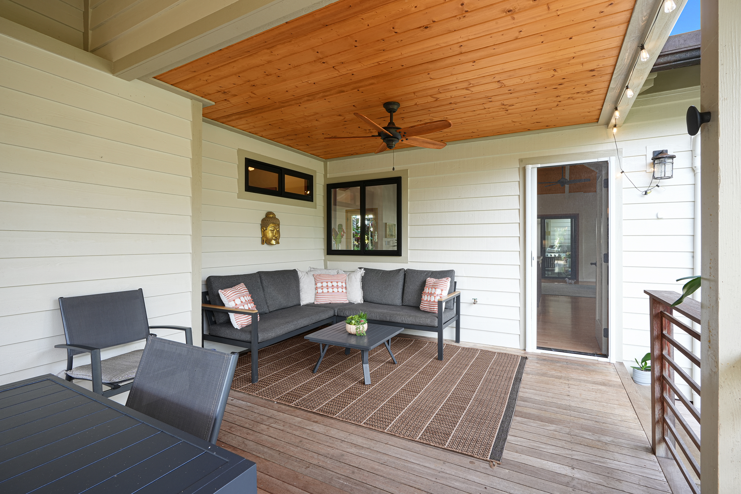 3667 Albert Road Princeville, HI 96722 - Photo 18 of 25 a outdoor living space with furniture and wooden floor