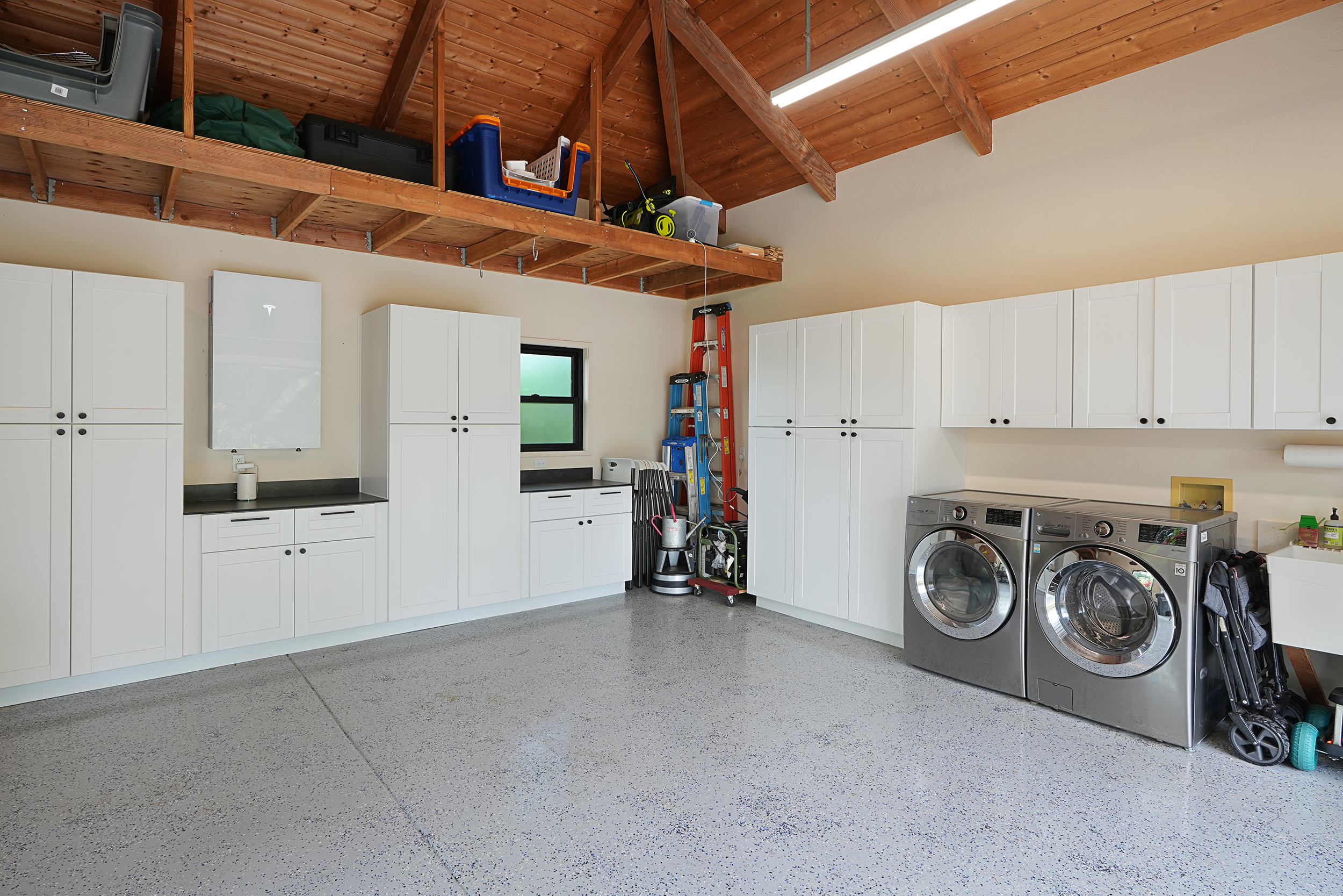 3667 Albert Road Princeville, HI 96722 - Photo 23 of 25 a view of a storage & utility room with washer and dryer