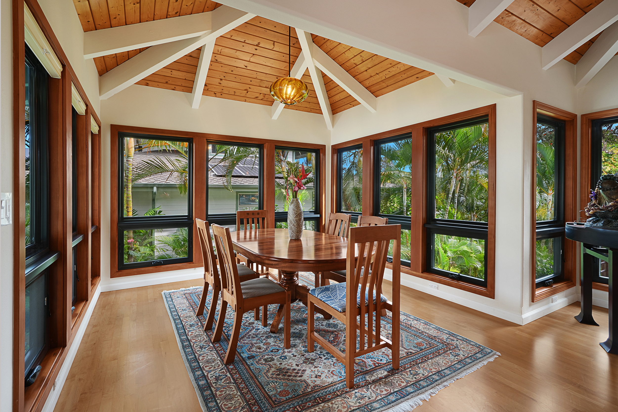 3667 Albert Road Princeville, HI 96722 - Photo 5 of 25 a dining room with furniture window and wooden floor