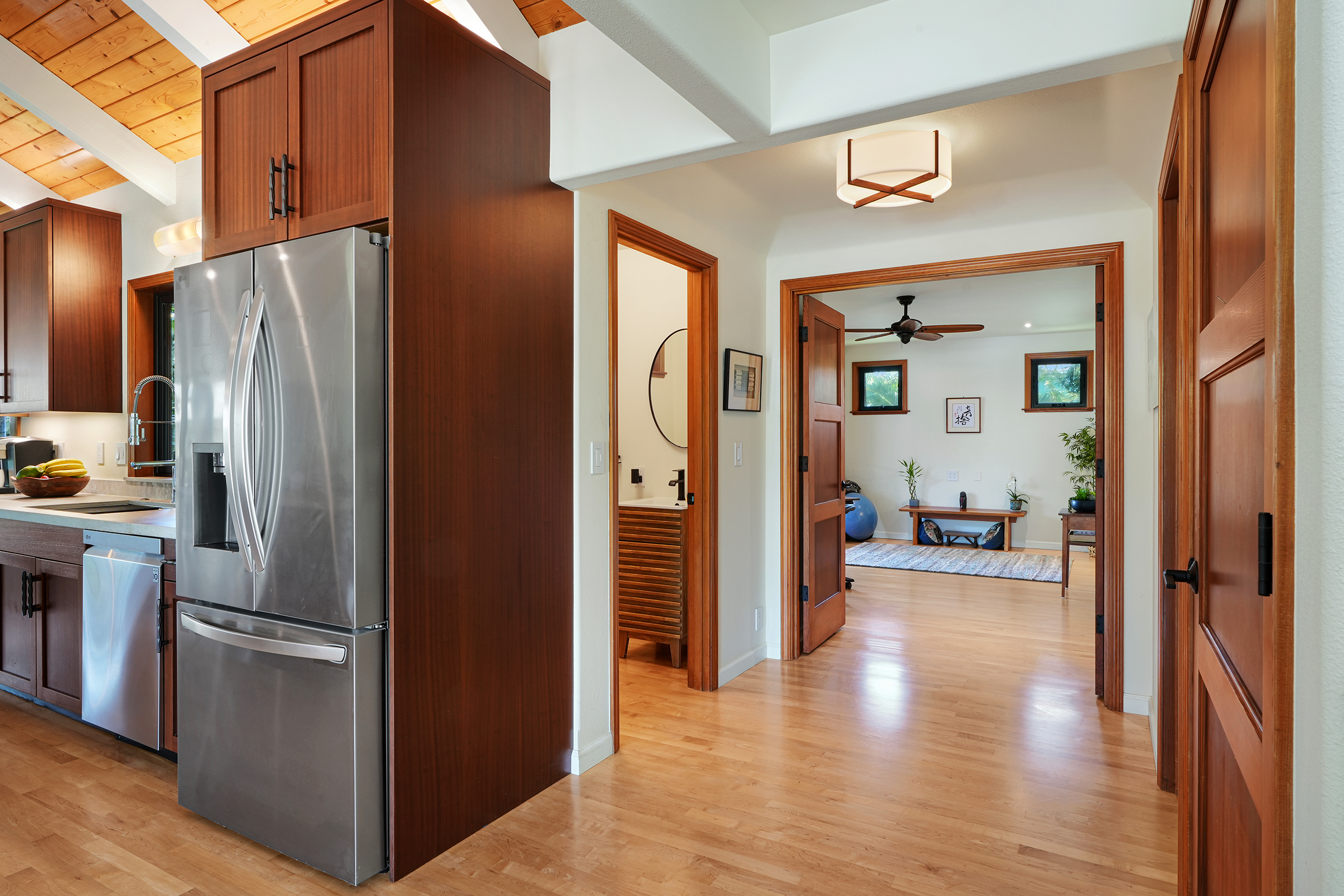 3667 Albert Road Princeville, HI 96722 - Photo 8 of 25 a view of a refrigerator in kitchen and wooden floor