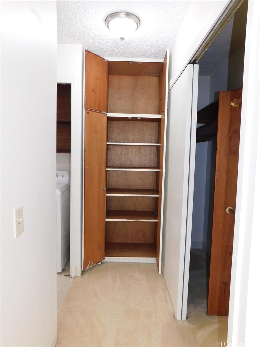 710 Lunalilo Street, Unit 301 Honolulu, HI 96813 - Photo 13 of 21 a view of walk in closet with empty racks