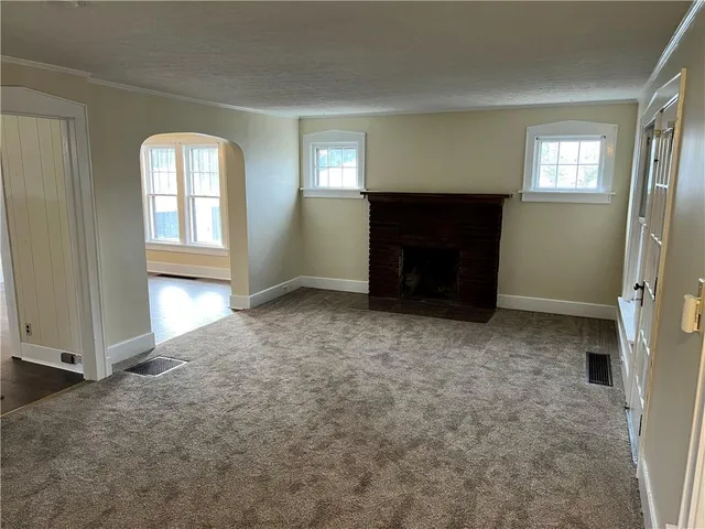 an empty room with windows