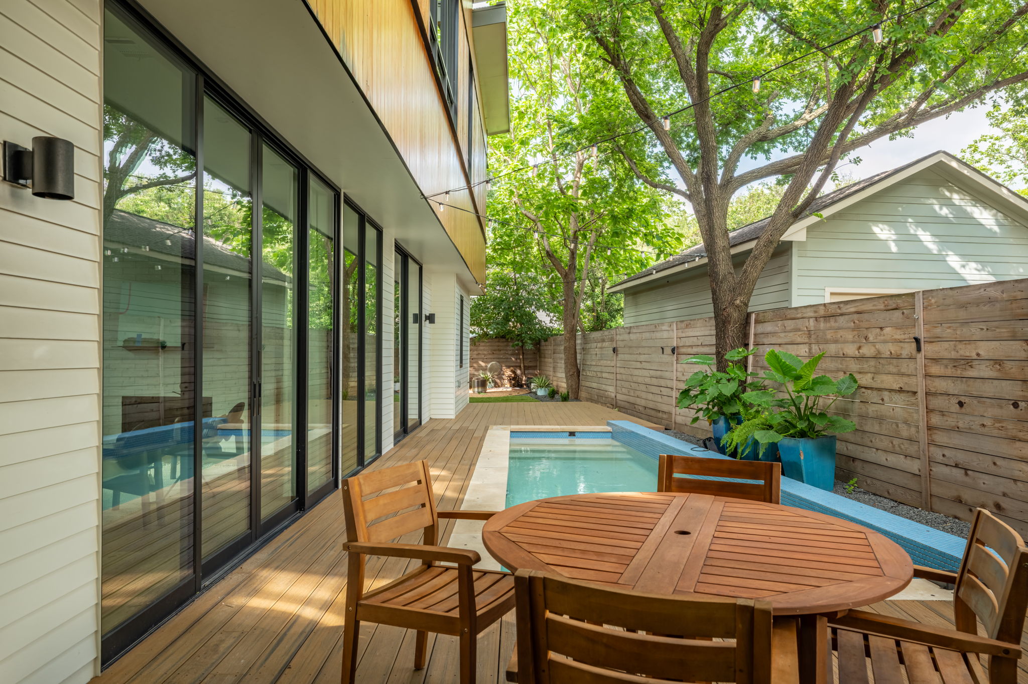 1811 Collier Street Austin, TX 78704 - Photo 32 of 40 Private backyard with a swimming pool and wood-finish decking