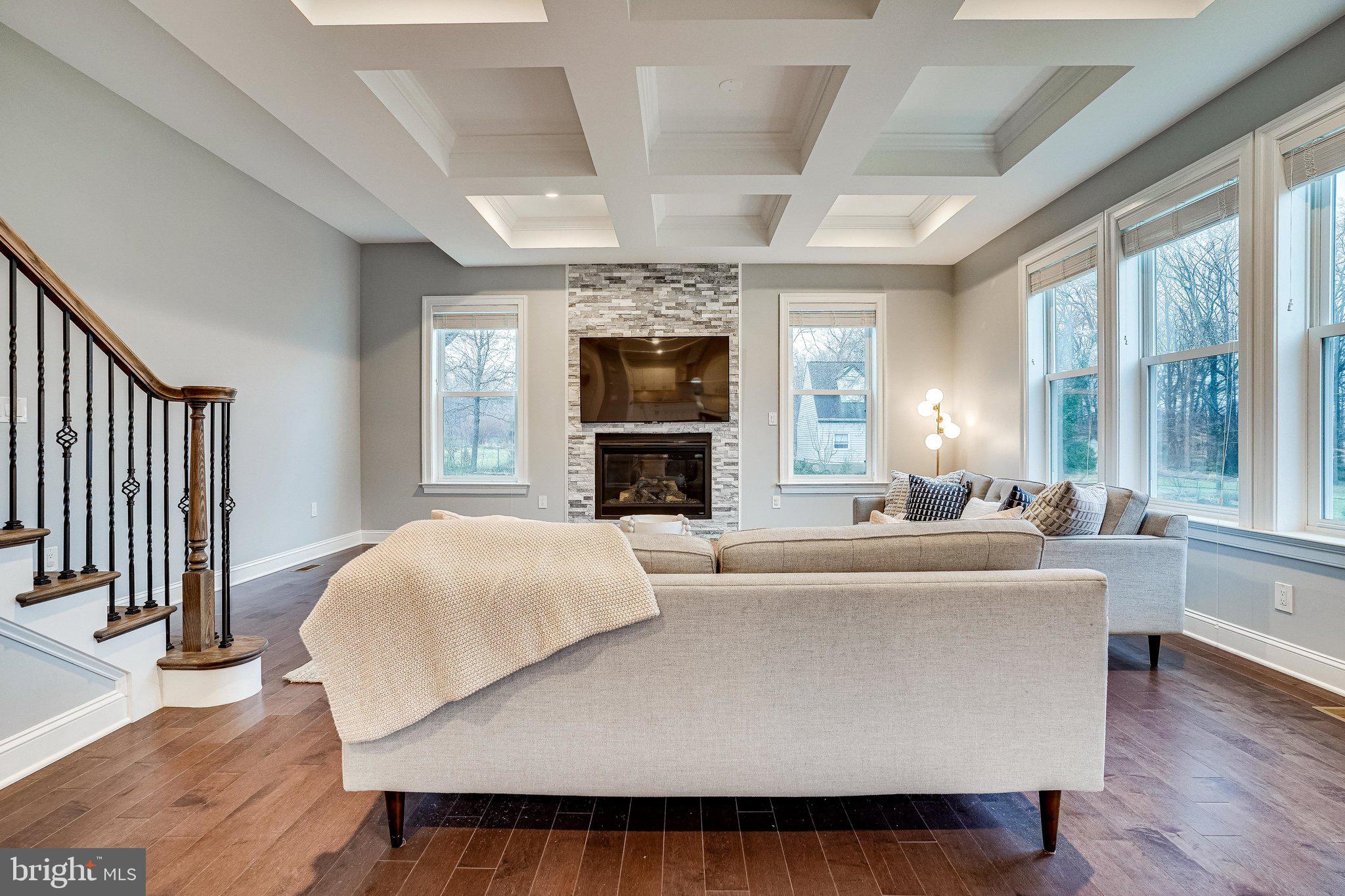 8733 Pohick Road Springfield, VA 22153 - Photo 16 of 40 a living room with fireplace furniture and a large window