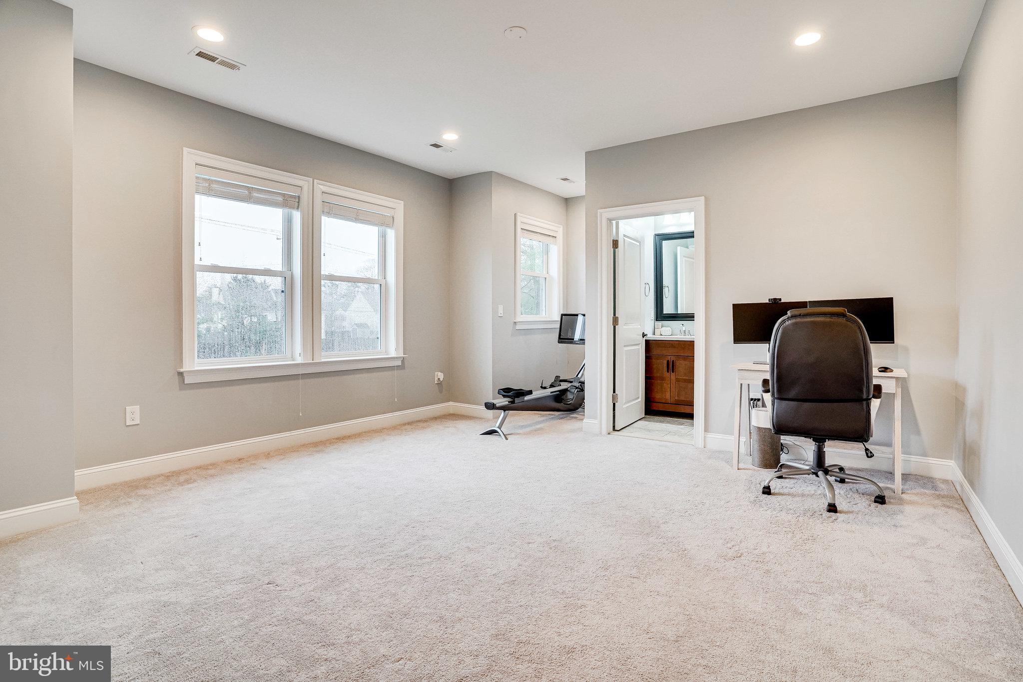 8733 Pohick Road Springfield, VA 22153 - Photo 33 of 40 a view of a livingroom with workspace and a window