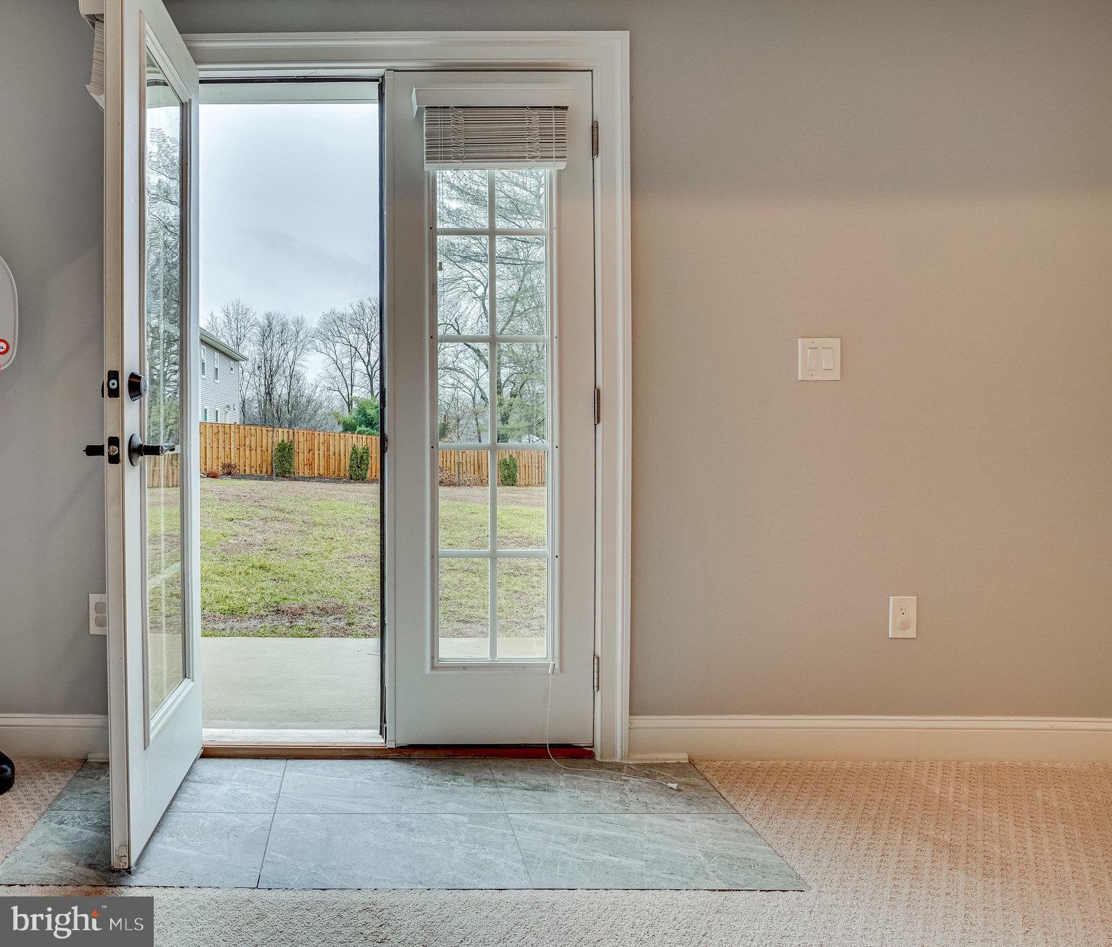 8733 Pohick Road Springfield, VA 22153 - Photo 37 of 40 a view of an empty room with a window