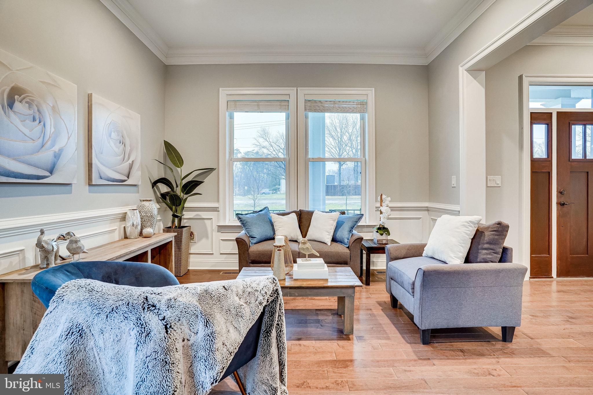 8733 Pohick Road Springfield, VA 22153 - Photo 5 of 40 a living room with furniture and a large window