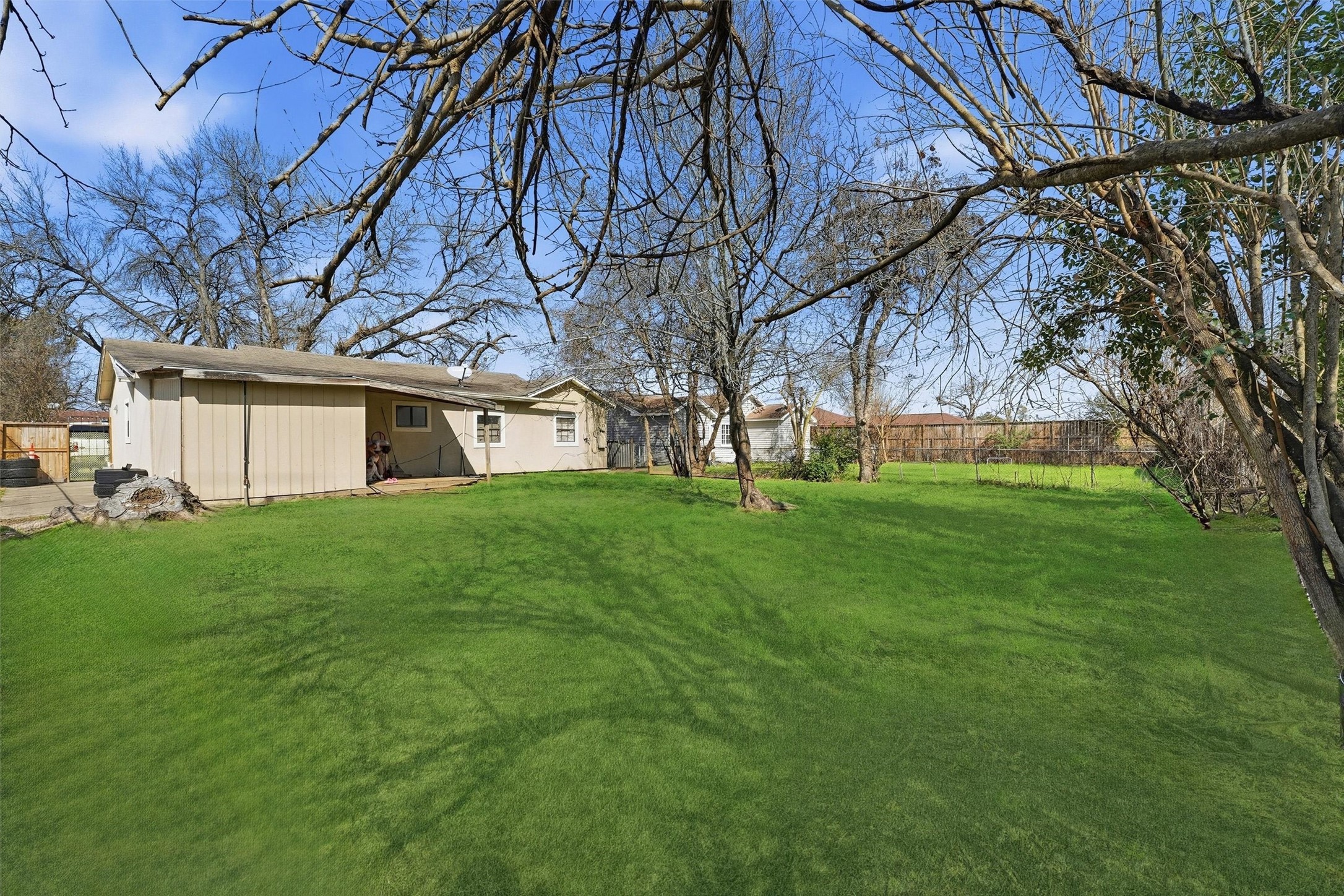 1002 Grenfell Lane Houston, TX 77076 - Photo 24 of 26 a front view of house with a garden