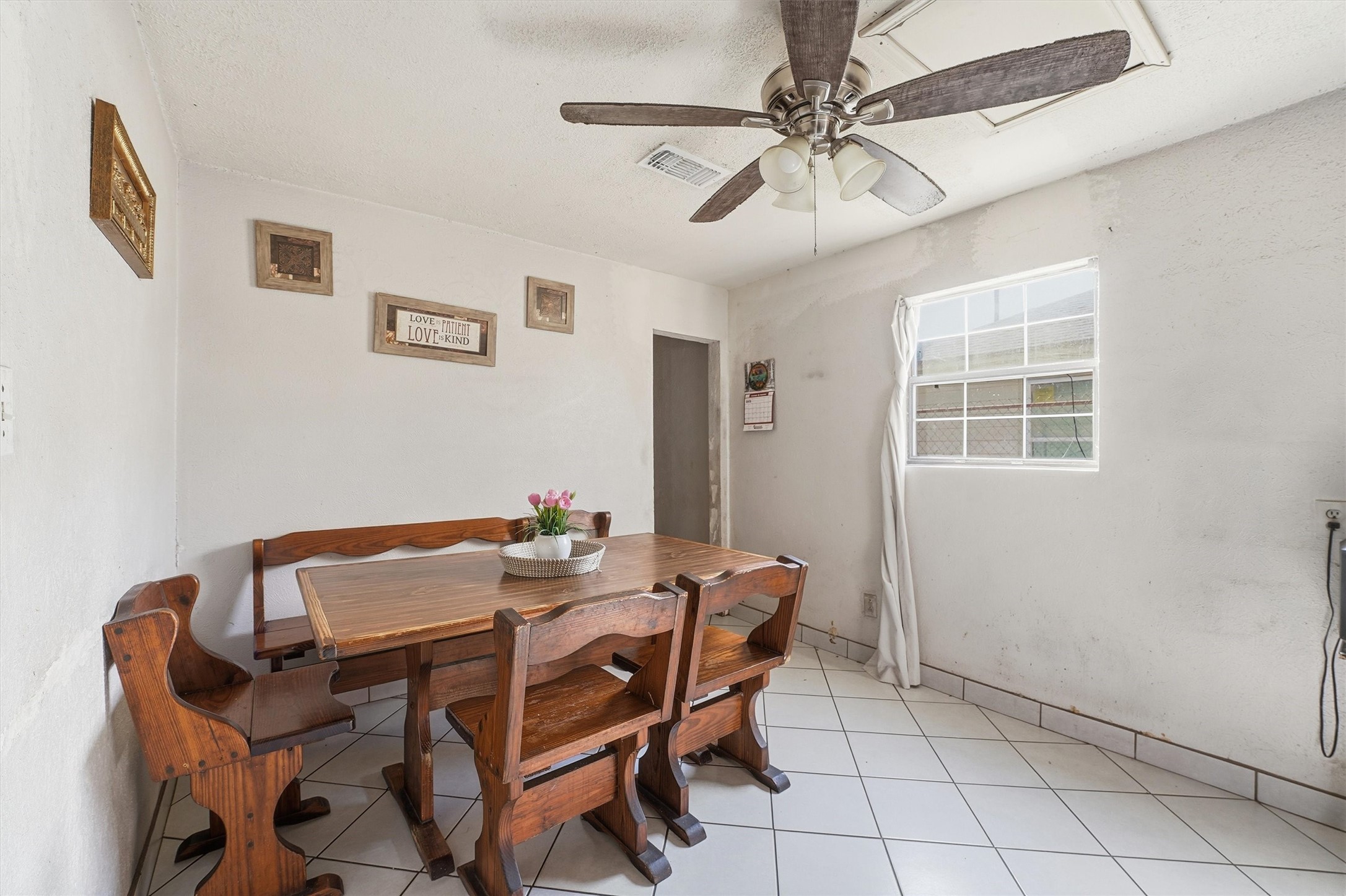 1002 Grenfell Lane Houston, TX 77076 - Photo 8 of 26 a dining room with furniture and window