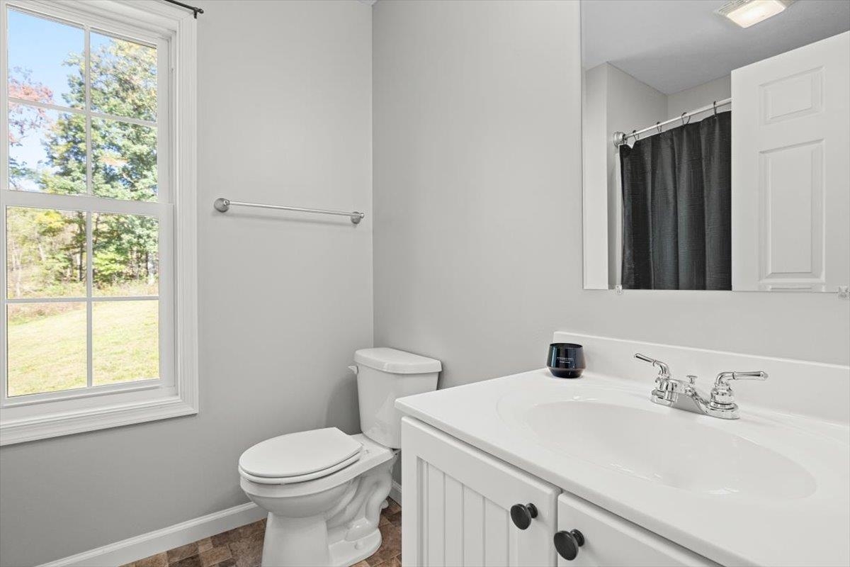 15531 Evergreen Valley Road Timberville, VA 22853 - Photo 20 of 34 a bathroom with a sink and a toilet