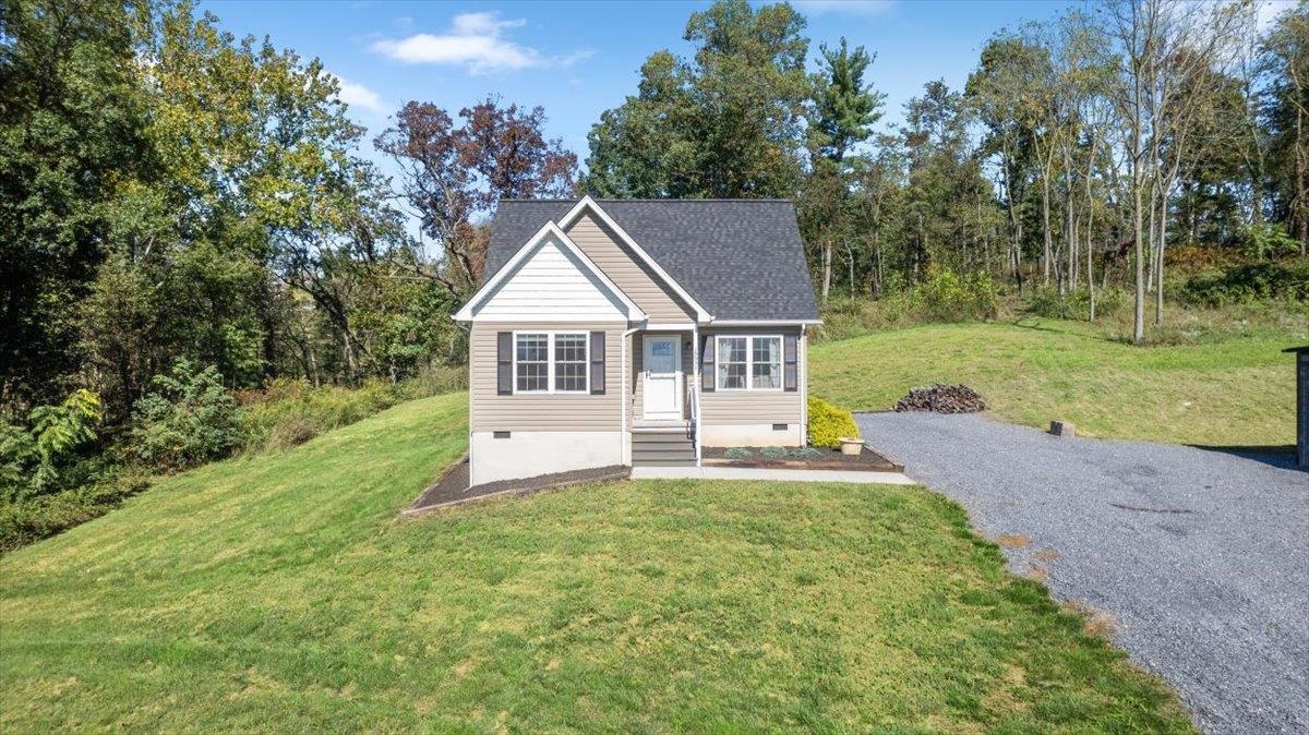 15531 Evergreen Valley Road Timberville, VA 22853 - Photo 27 of 34 a view of a house with a yard and sitting area