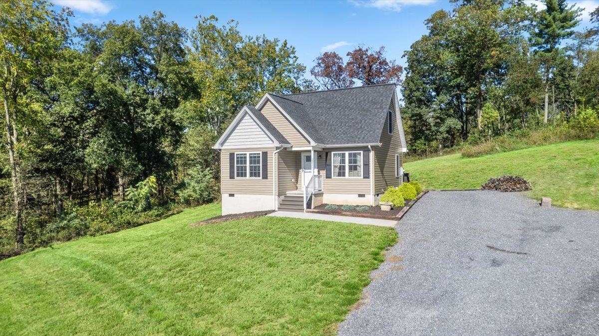 15531 Evergreen Valley Road Timberville, VA 22853 - Photo 28 of 34 a front view of a house with yard and green space