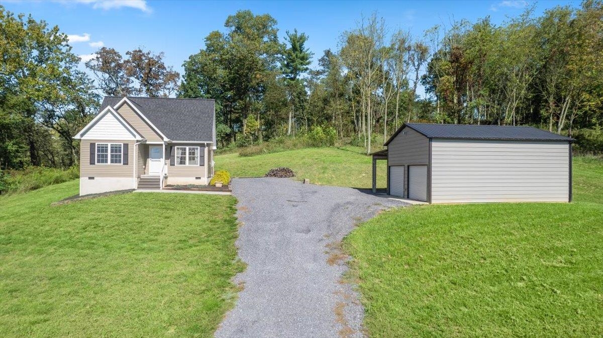 15531 Evergreen Valley Road Timberville, VA 22853 - Photo 30 of 34 a front view of a house with garden