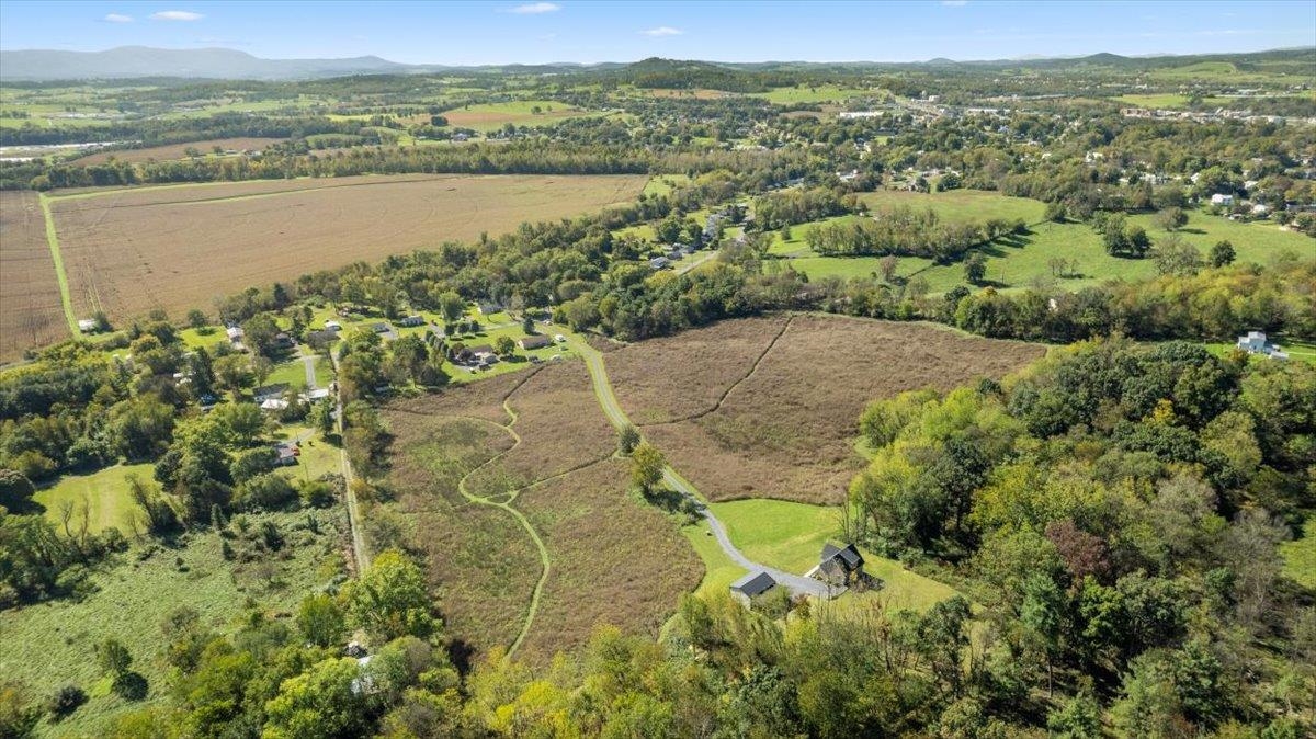 15531 Evergreen Valley Road Timberville, VA 22853 - Photo 32 of 34 a view of a lake with a mountain