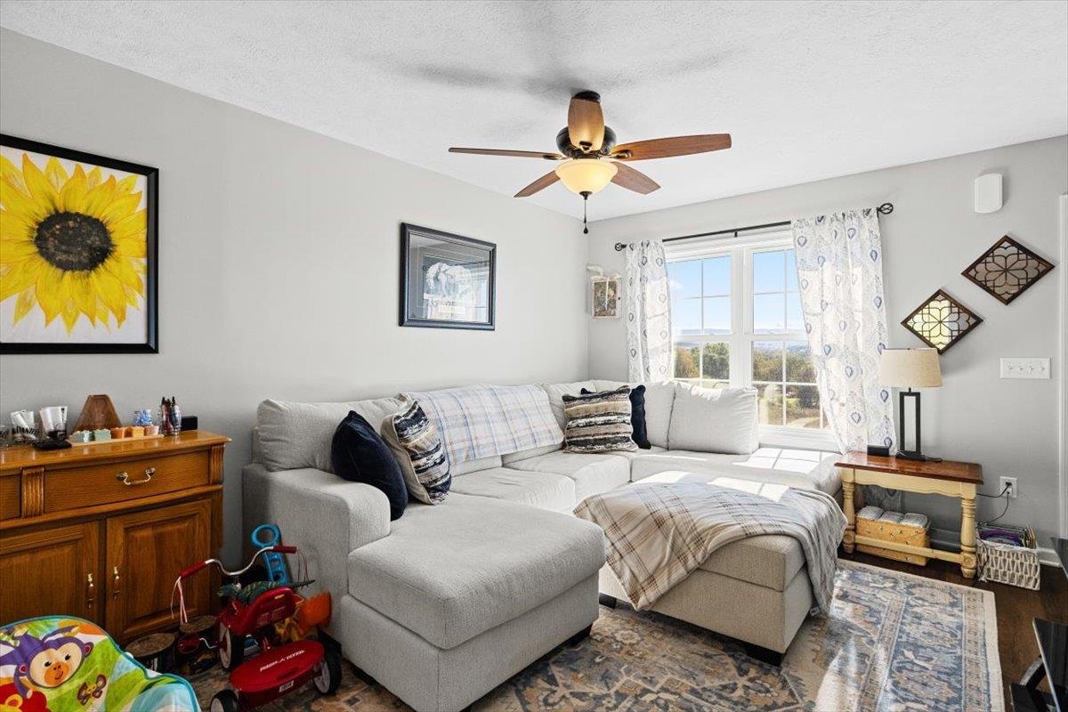 15531 Evergreen Valley Road Timberville, VA 22853 - Photo 7 of 34 a living room with furniture and a window