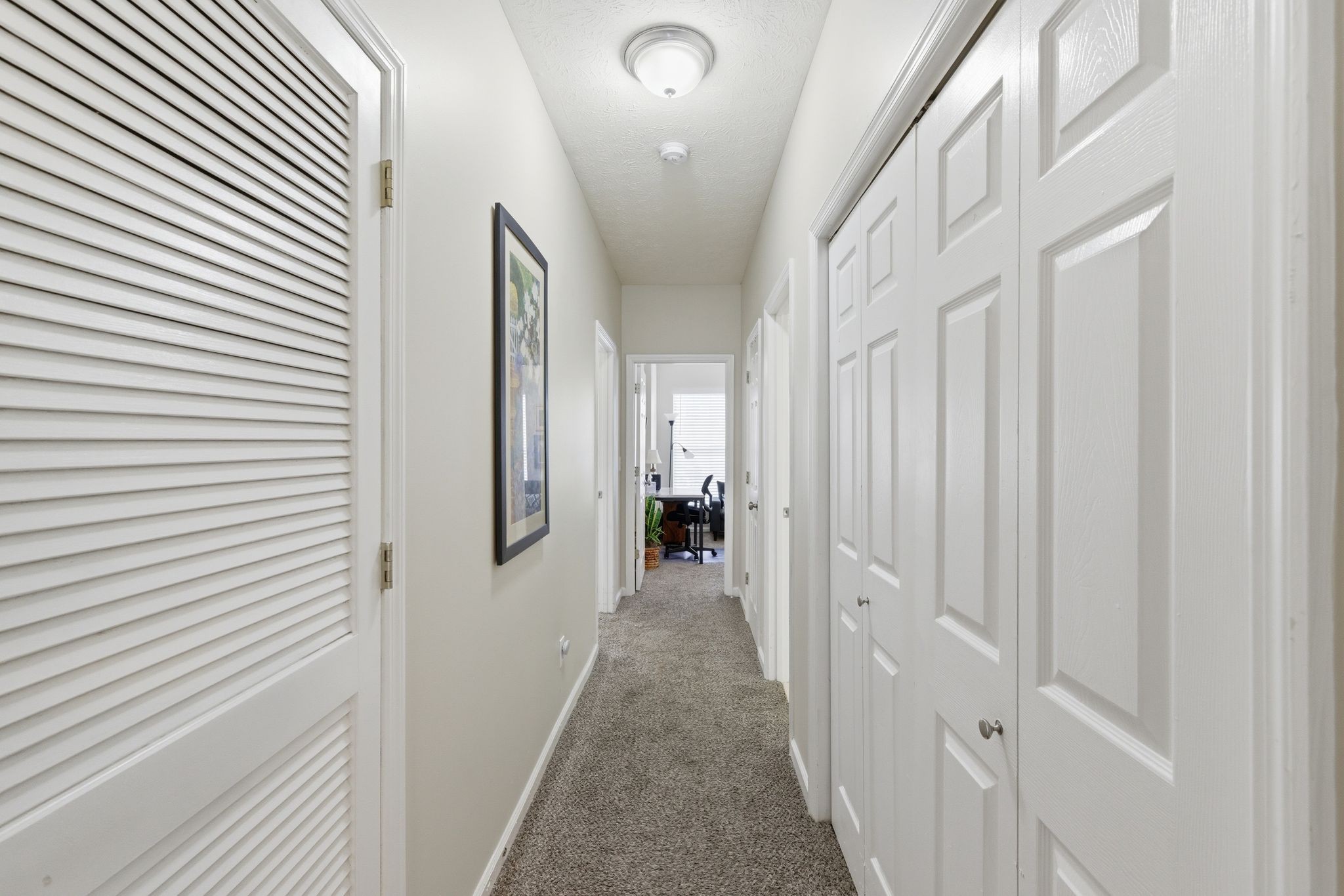 609 Churchill Crossing Madison, TN 37115 - Photo 13 of 26 a view of a hallway with white walls and stairs