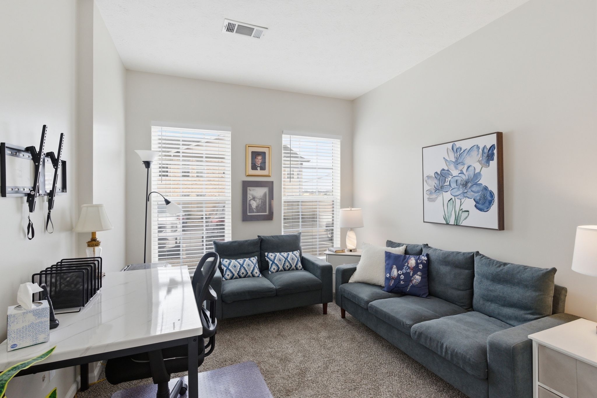 609 Churchill Crossing Madison, TN 37115 - Photo 15 of 26 a living room with furniture two windows and a table