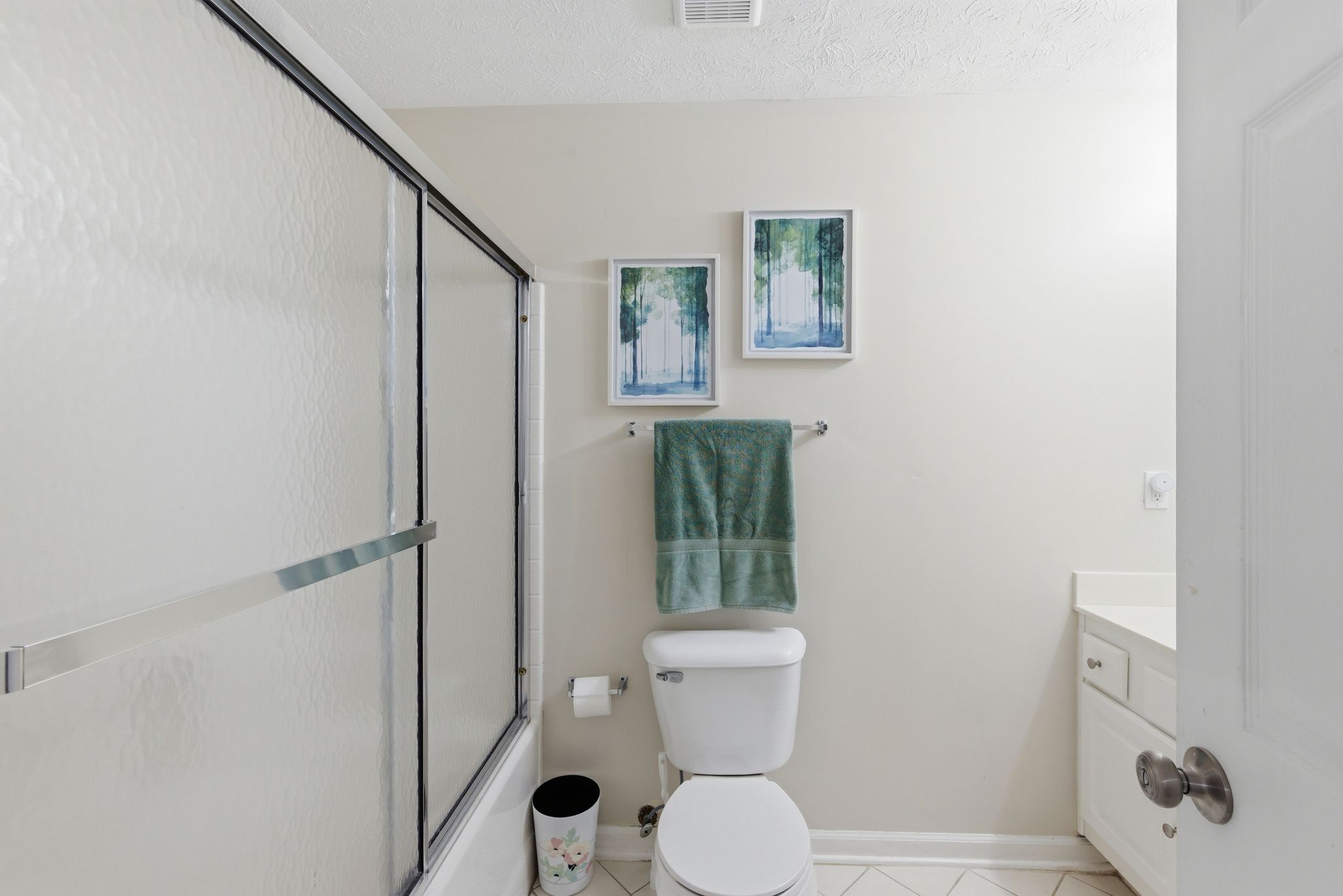 609 Churchill Crossing Madison, TN 37115 - Photo 18 of 26 a bathroom with a toilet and a shower