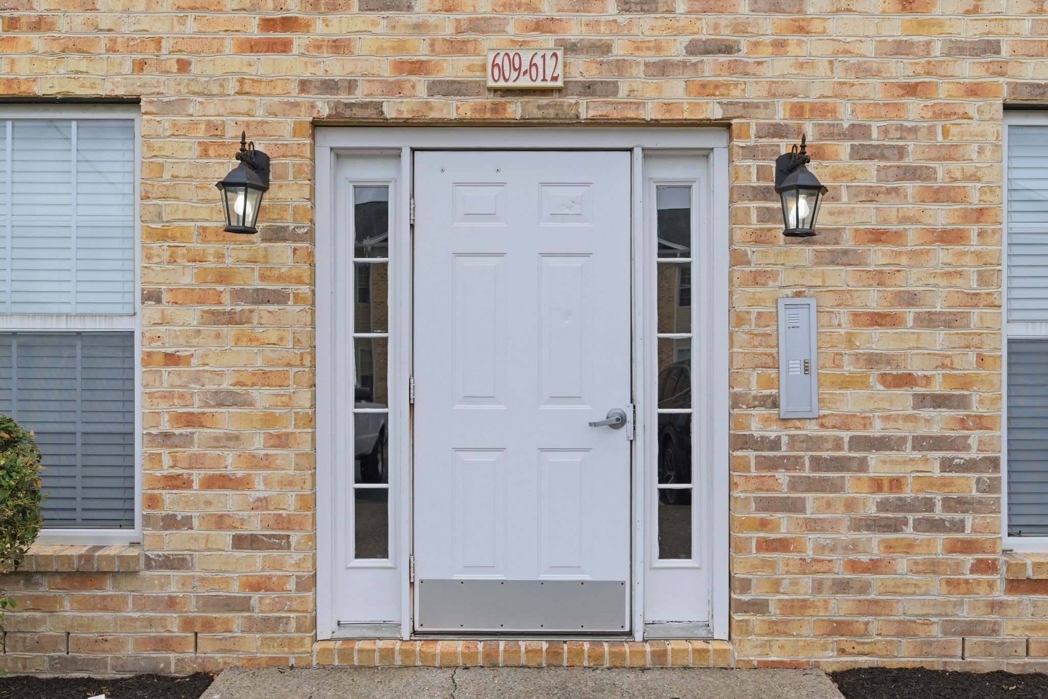 609 Churchill Crossing Madison, TN 37115 - Photo 2 of 26 a brick building with a door and a shower