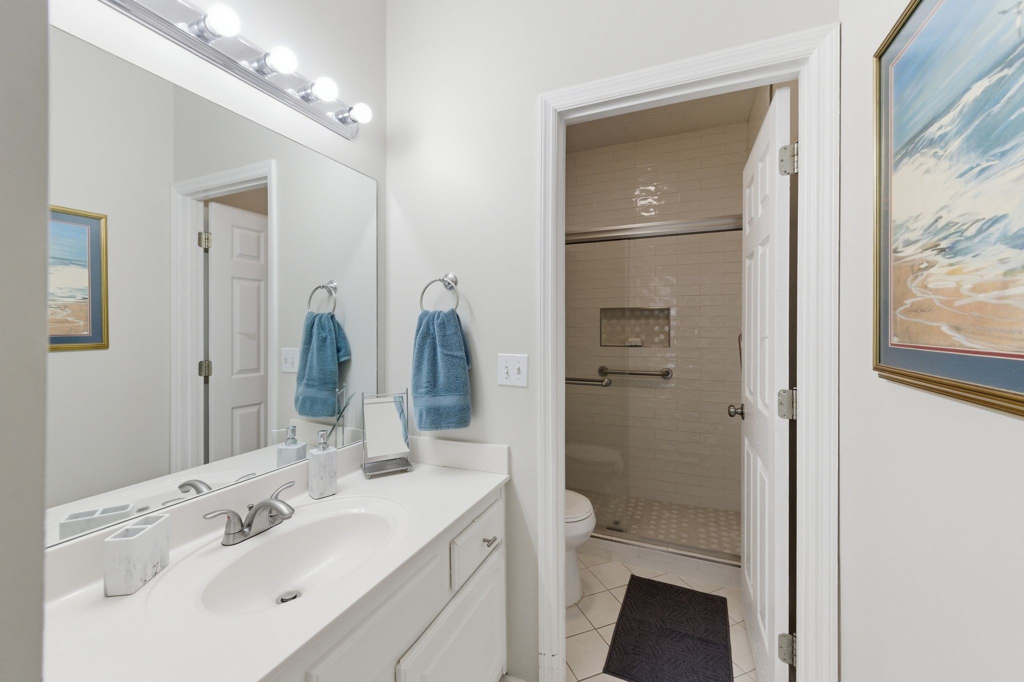 609 Churchill Crossing Madison, TN 37115 - Photo 22 of 26 a bathroom with a sink a toilet and shower