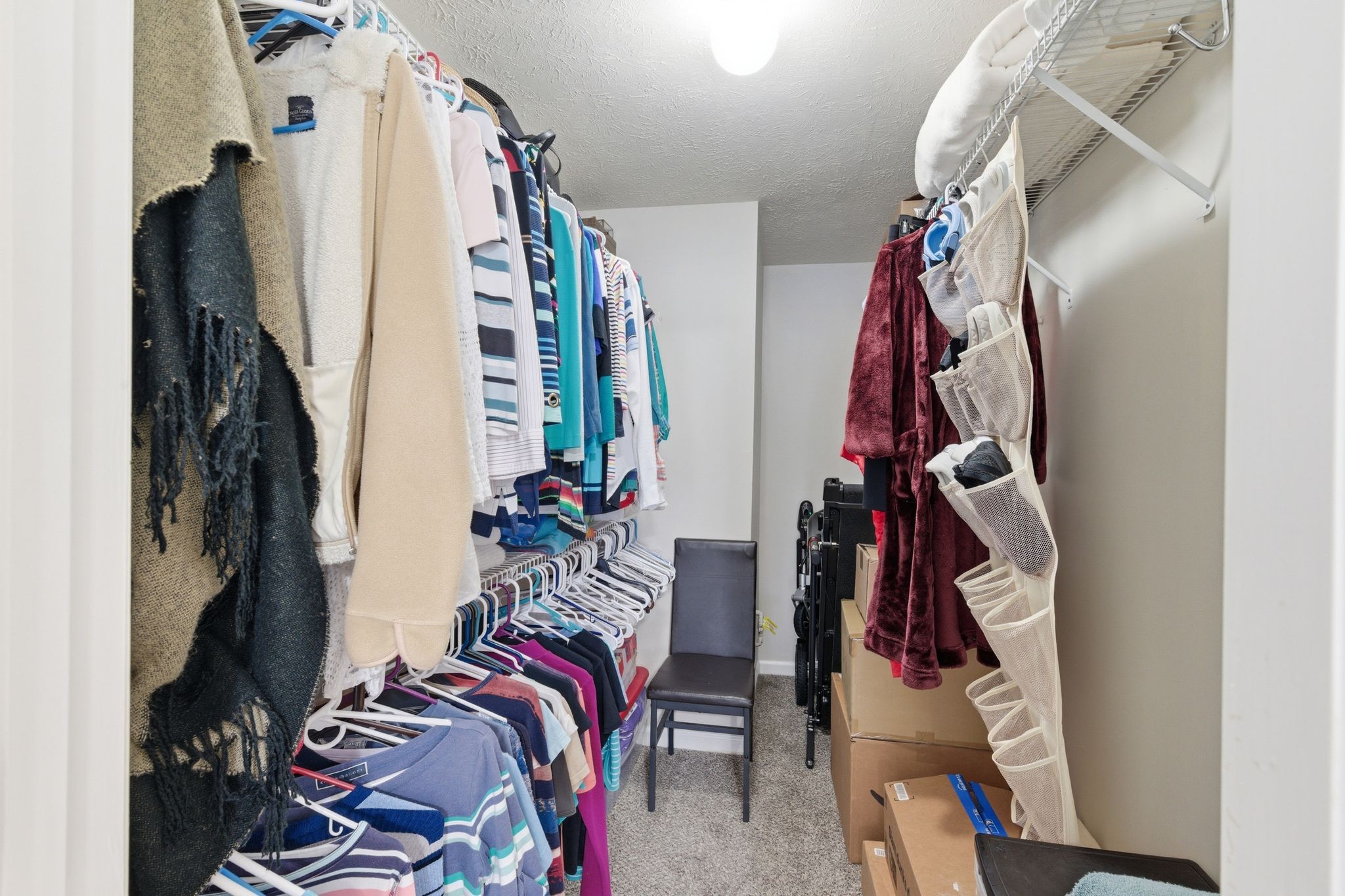 609 Churchill Crossing Madison, TN 37115 - Photo 24 of 26 a view of walk in closet with clothes