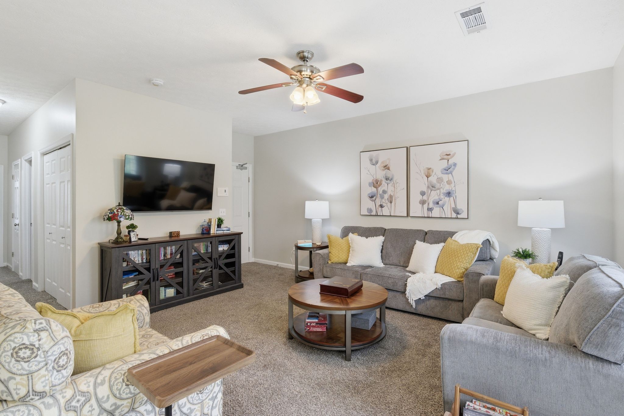 609 Churchill Crossing Madison, TN 37115 - Photo 6 of 26 a living room with furniture and a flat screen tv