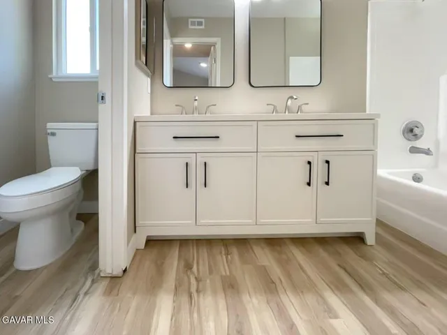 a view of a livingroom from a hallway