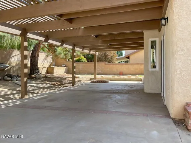 a backyard of a house with seating space