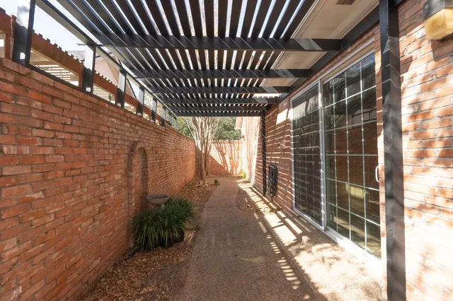 a view of a backyard of the house