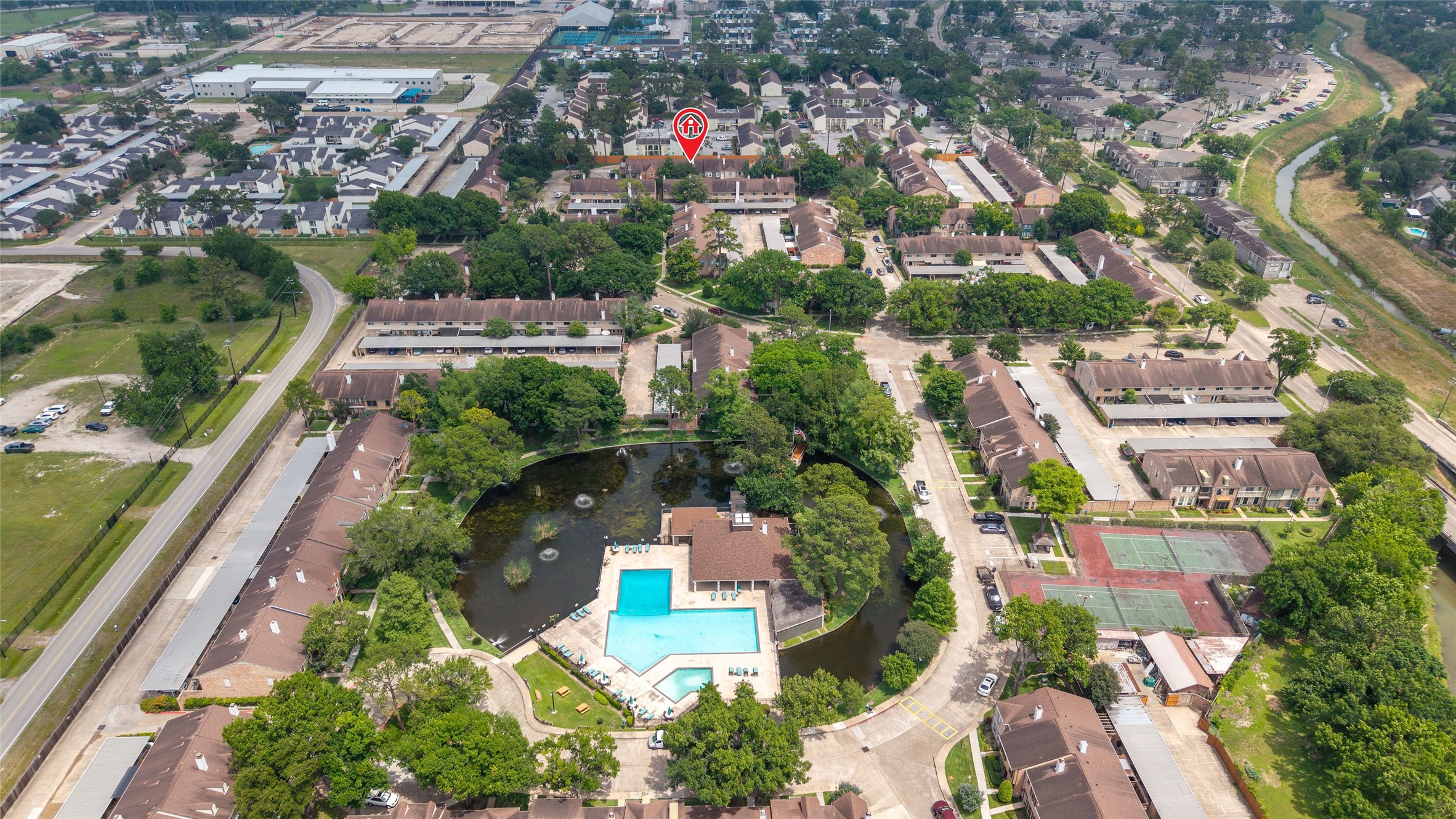 5800 Lumberdale Road, Unit 55 Houston, TX 77092 - Photo 32 of 34 an aerial view of residential houses with outdoor space