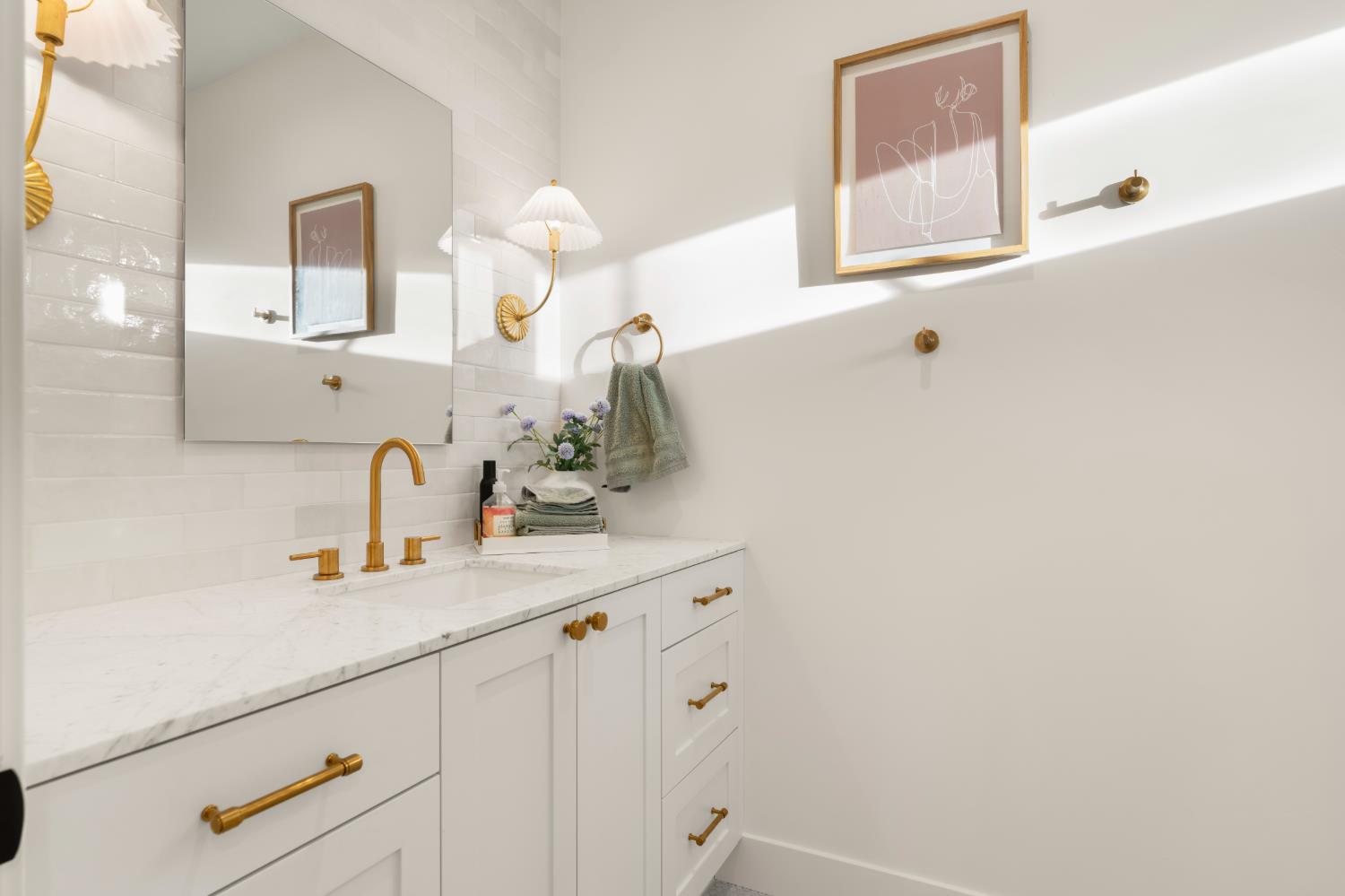 7697 Horseshoe Bar Road Loomis, CA 95650 - Photo 51 of 76 a bathroom with a sink and a mirror