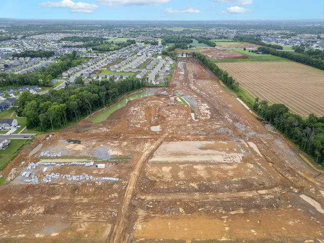 an aerial view of a house with a garden