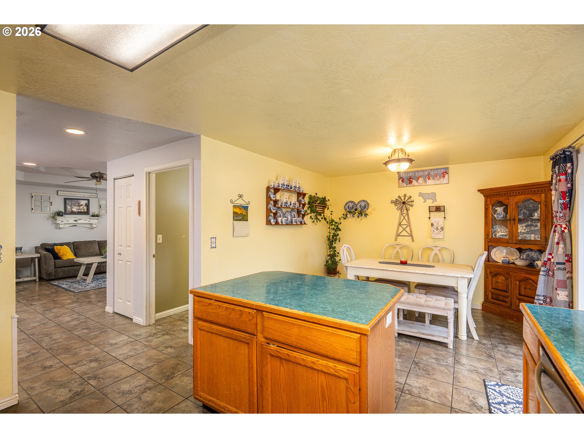 90 South 17th Street Cottage Grove, OR 97424 - Photo 6 of 23 a kitchen that has a table and chairs in it